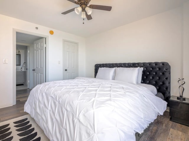 bedroom featuring dark hardwood / wood-style flooring and ceiling fan