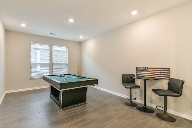 game room with dark hardwood / wood-style floors and pool table