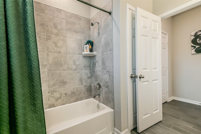 bathroom featuring shower / tub combo with curtain