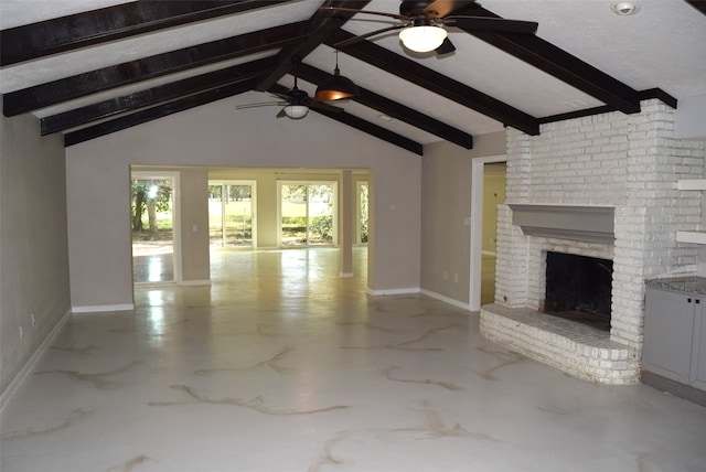 unfurnished living room with ceiling fan, vaulted ceiling with beams, and a fireplace