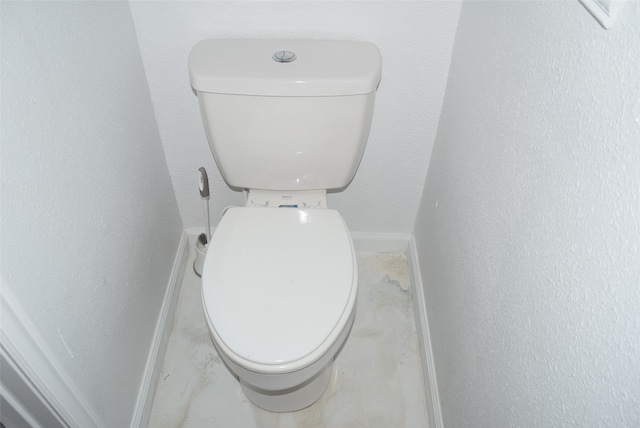 bathroom featuring toilet