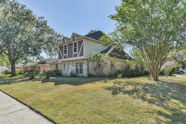 view of home's exterior with a lawn