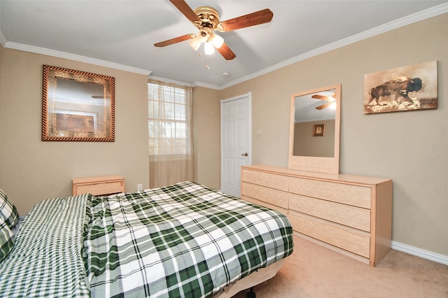 bedroom featuring ornamental molding, carpet, and ceiling fan