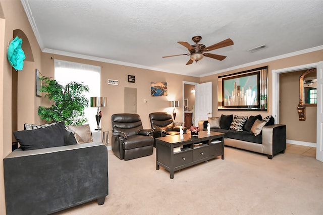 living room with light carpet, ornamental molding, and ceiling fan