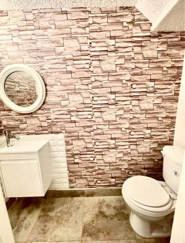 3600 Jeanetta St Unit 502, Houston, TX 77063 - bathroom with toilet, a textured ceiling, and vanity