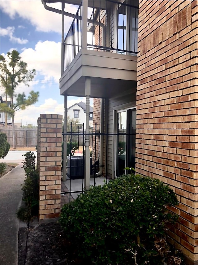 3600 Jeanetta St Unit 502, Houston, TX 77063 - view of patio with a balcony and fence