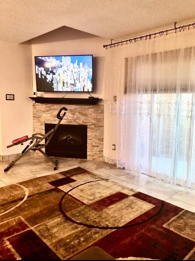 3600 Jeanetta St Unit 502, Houston, TX 77063 - living area featuring tile patterned floors and a textured ceiling