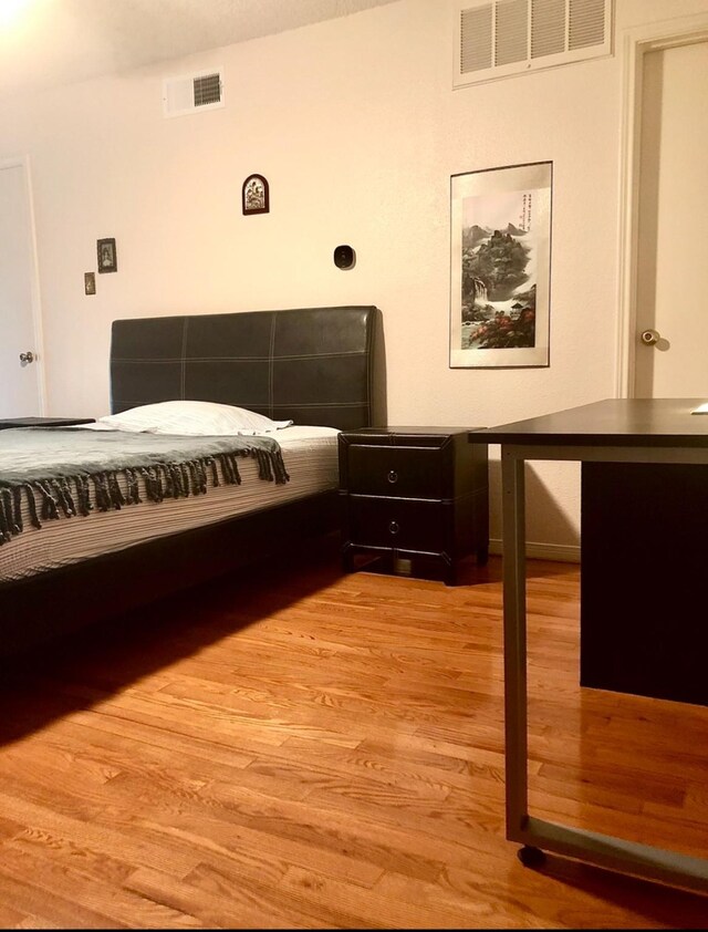 3600 Jeanetta St Unit 502, Houston, TX 77063 - bedroom with light wood-type flooring