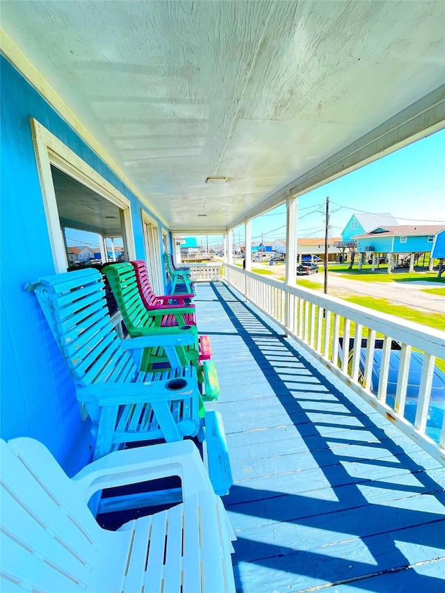 2619 Swan Ct, Surfside Beach, TX 77541 - view of wooden porch