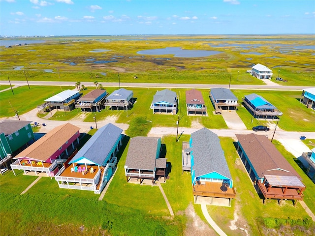 2619 Swan Ct, Surfside Beach, TX 77541 - aerial perspective of suburban area with a large body of water