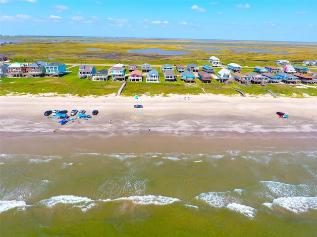 2619 Swan Ct, Surfside Beach, TX 77541 - aerial perspective of suburban area with waterfront with a beach