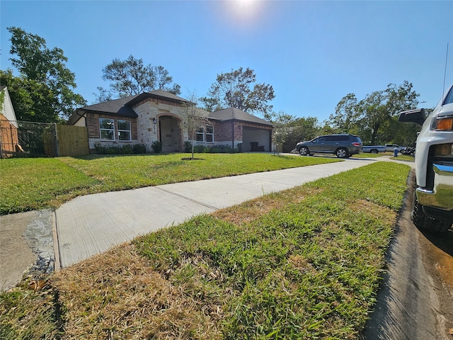 view of front facade with a front lawn