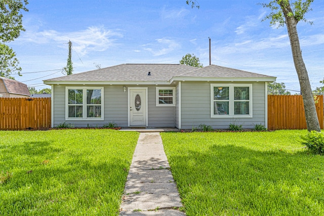 view of front of house with a front lawn