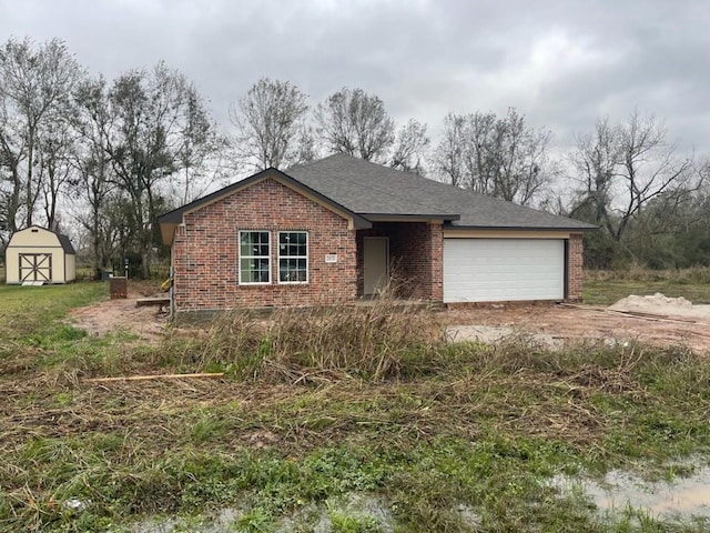 single story home with a garage