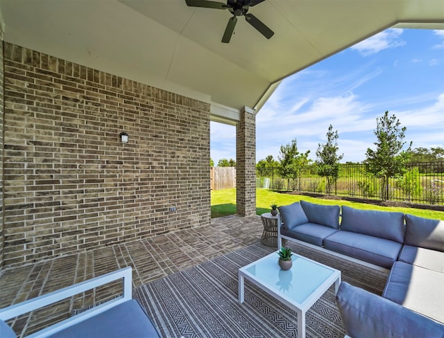 view of patio / terrace with ceiling fan and an outdoor hangout area