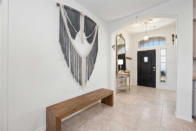 foyer entrance featuring light tile patterned floors