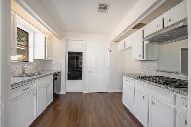 kitchen featuring black appliances, dark hardwood / wood-style flooring, white cabinetry, and sink