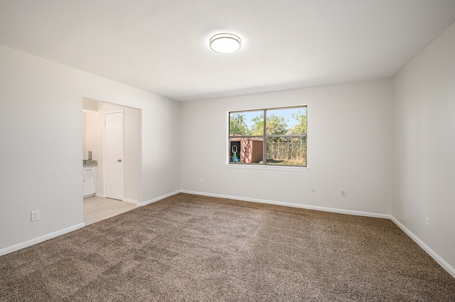 view of carpeted spare room