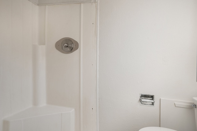 bathroom featuring toilet