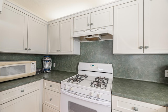 kitchen with white cabinets and white appliances