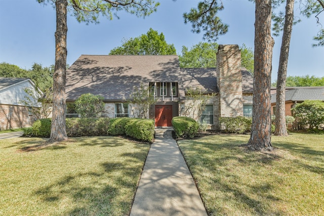 tudor house with a front yard