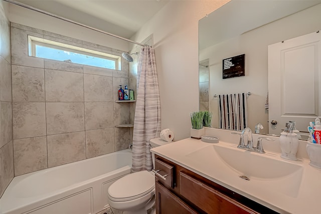 full bathroom with shower / tub combo, vanity, and toilet