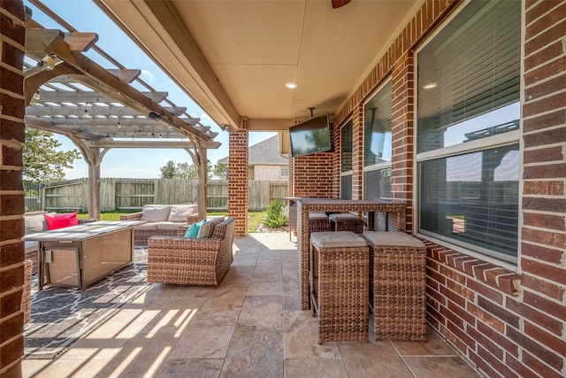 view of patio / terrace with an outdoor hangout area and a pergola