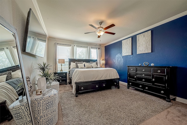 bedroom with ornamental molding, carpet flooring, and ceiling fan