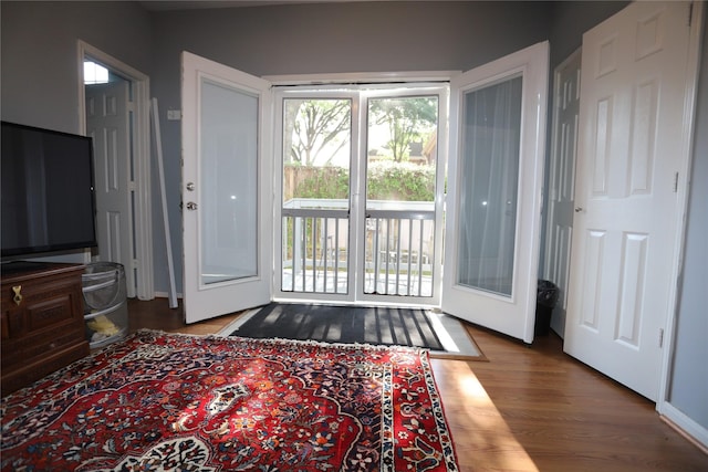 doorway to outside featuring hardwood / wood-style floors