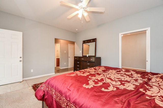 bedroom featuring ceiling fan and light tile patterned floors