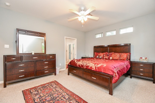 bedroom featuring ceiling fan and light colored carpet