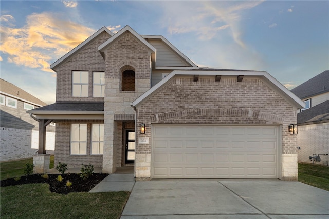 view of front of home with a garage