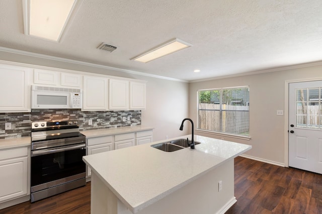 kitchen with stainless steel range with electric cooktop, dark wood-type flooring, a center island with sink, sink, and white cabinets