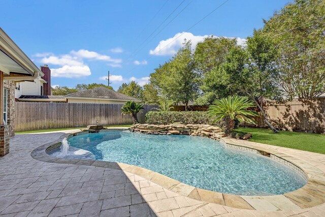 view of pool featuring a patio area and pool water feature