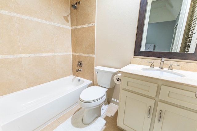 full bathroom with tile patterned floors, vanity, tiled shower / bath combo, and toilet