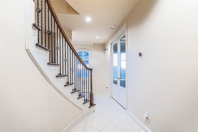 foyer entrance with a water view