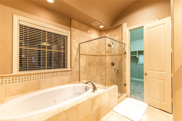 bathroom featuring shower with separate bathtub and tile patterned floors