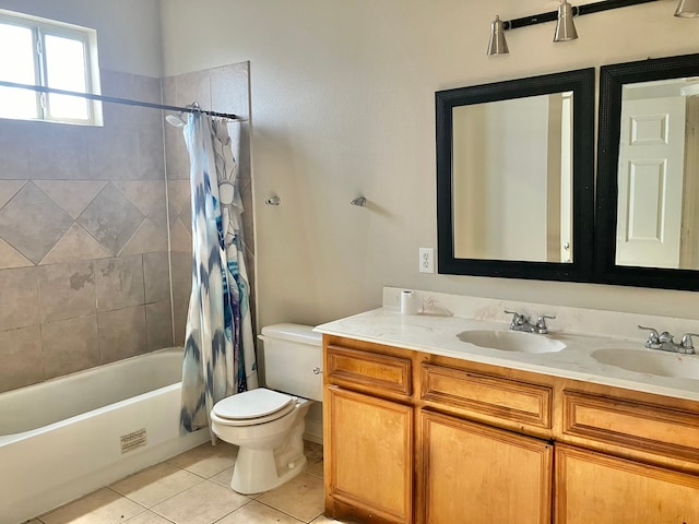 full bathroom with tile patterned flooring, shower / bath combo, vanity, and toilet