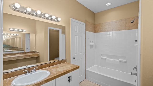 full bathroom with shower / bathing tub combination, tile patterned flooring, vanity, and toilet