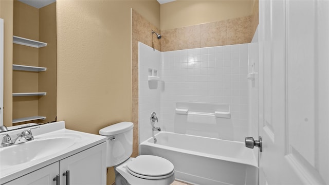 full bathroom with tiled shower / bath combo, vanity, and toilet