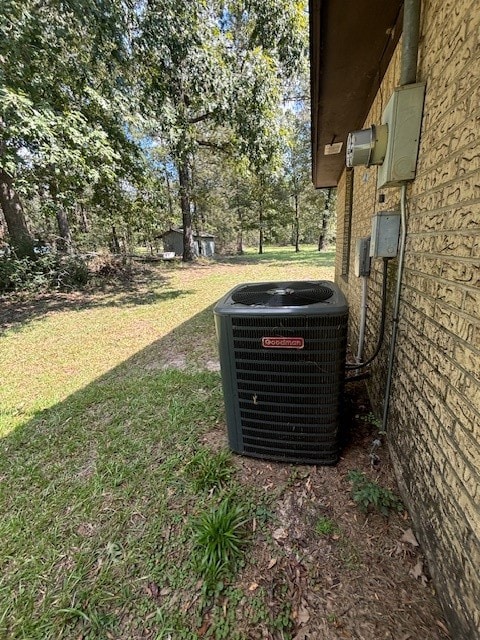 exterior details featuring central AC