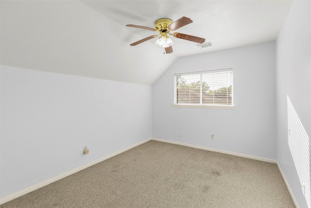 additional living space featuring carpet, ceiling fan, and lofted ceiling