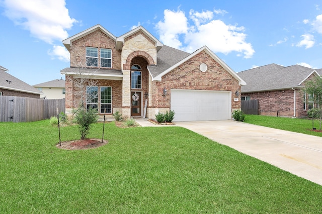 front of property featuring a garage and a front yard