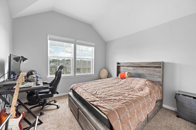 carpeted bedroom featuring lofted ceiling