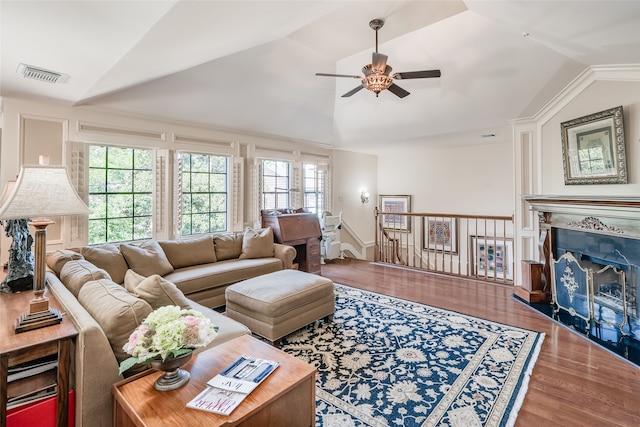 living room featuring lofted ceiling, ceiling fan, and hardwood / wood-style floors