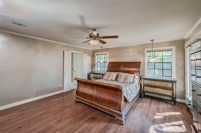 bedroom featuring ceiling fan with notable chandelier, crown molding, and dark hardwood / wood-style flooring