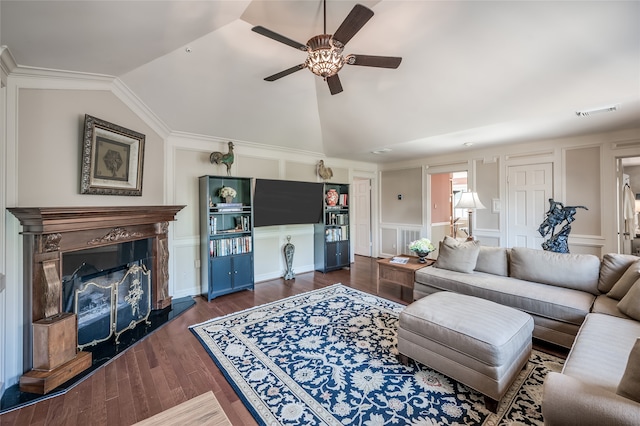 living room with visible vents, a decorative wall, and vaulted ceiling