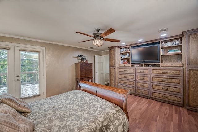 bedroom featuring ceiling fan, french doors, crown molding, light hardwood / wood-style flooring, and access to exterior