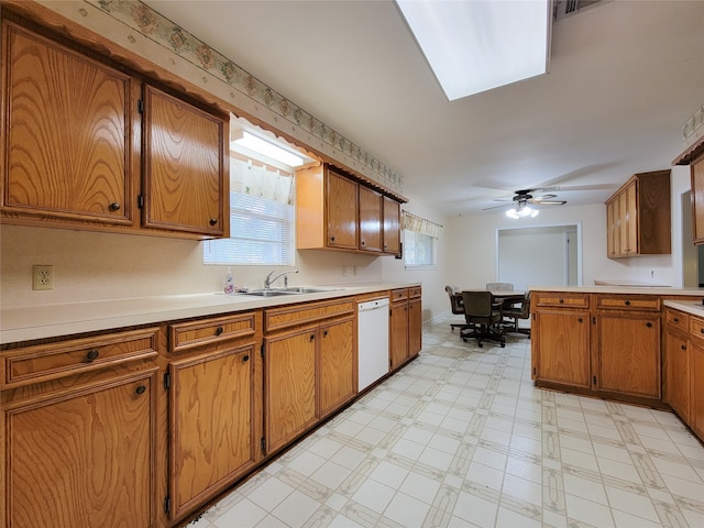 kitchen with ceiling fan, dishwasher, plenty of natural light, and sink