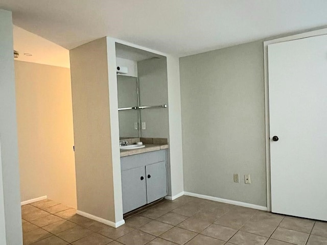 bathroom featuring vanity and tile patterned flooring